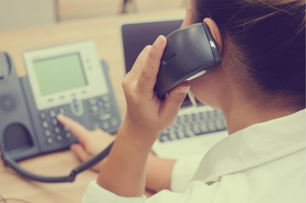 woman using phone system